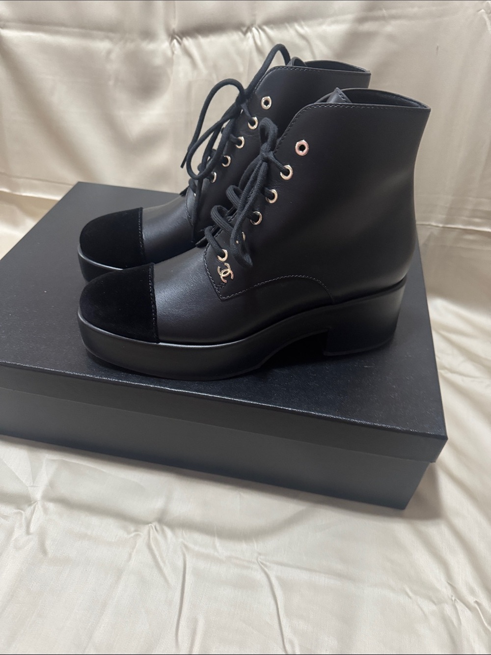 CHANEL Black Leather Lace-Up Platform Ankle Boots with Gold Accents